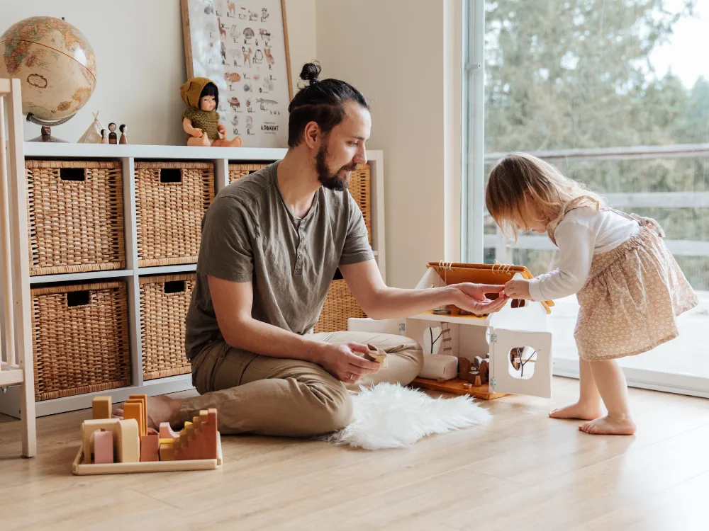 Man playing with child